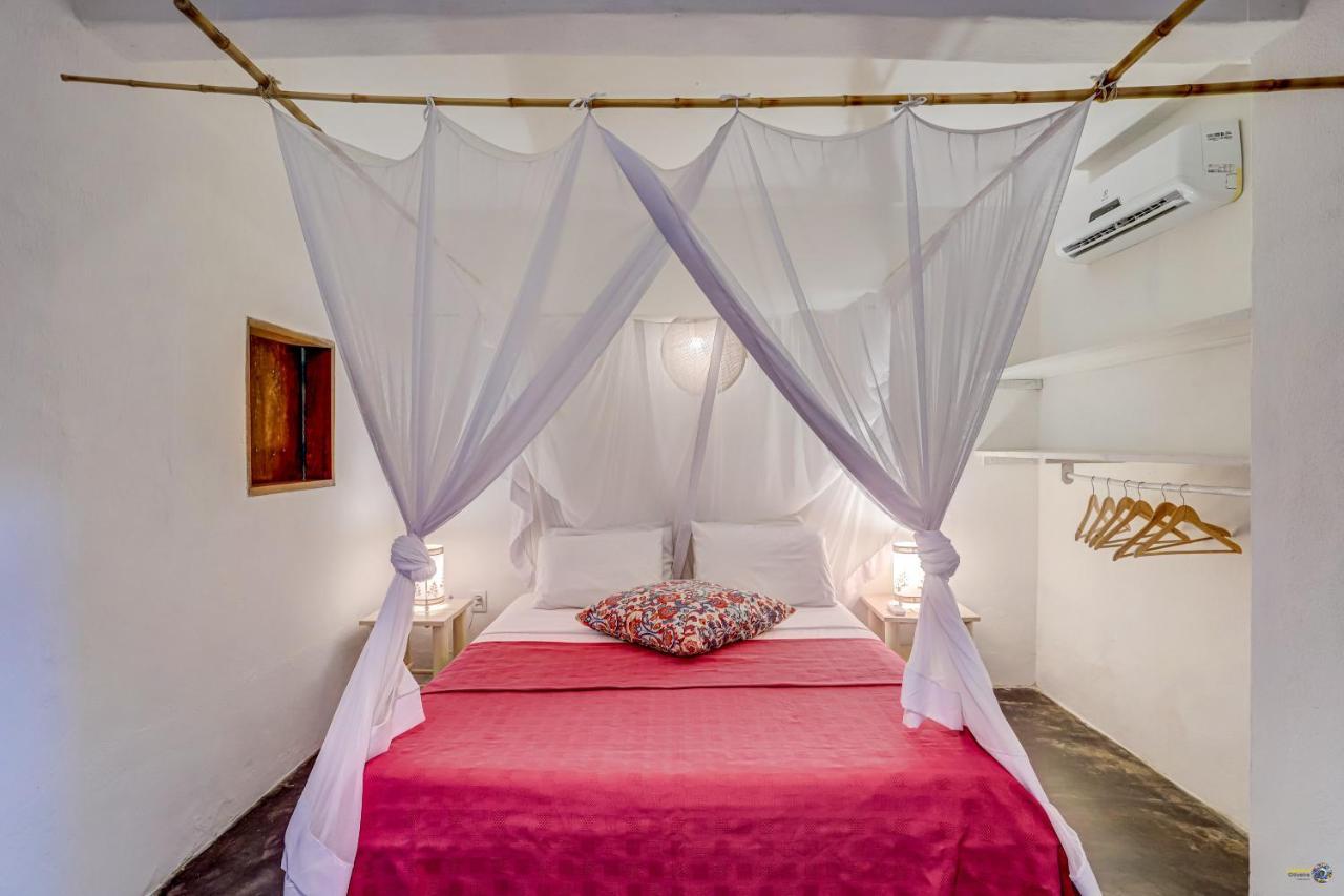 Quarto Triplo com Vista do Jardim